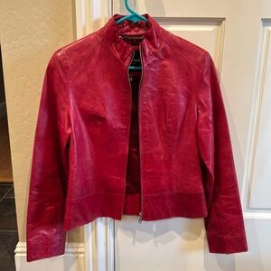 Red women’s Andrew Marc leather jacket small.